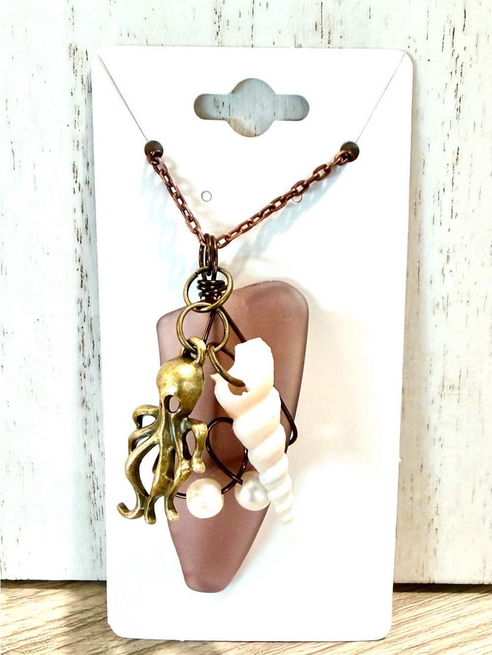 90. Handcrafted burgundy Sea Glass Necklace with Octopus & Shell Charms